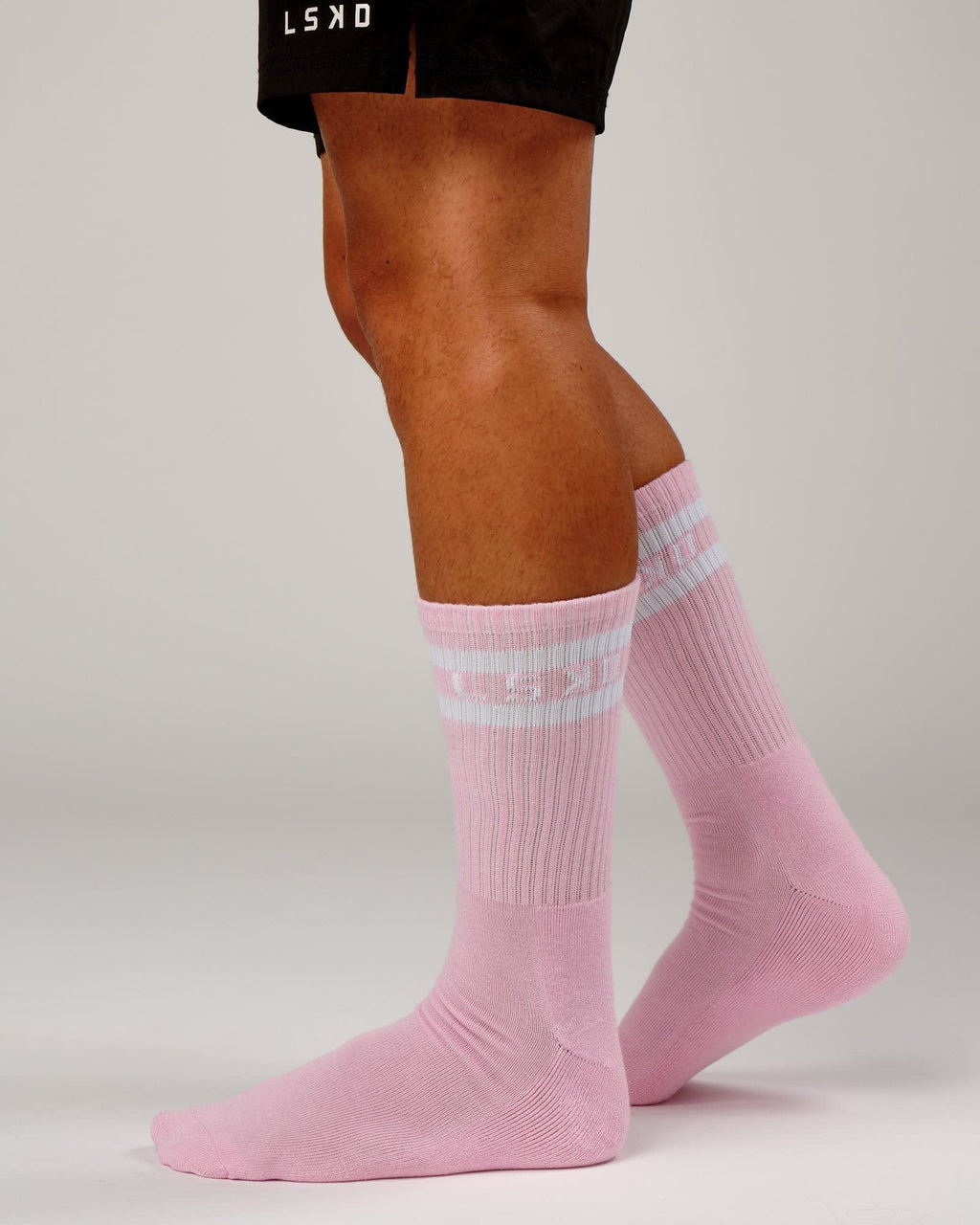 Model wearing Unisex A-Line Sock - Petal Pink