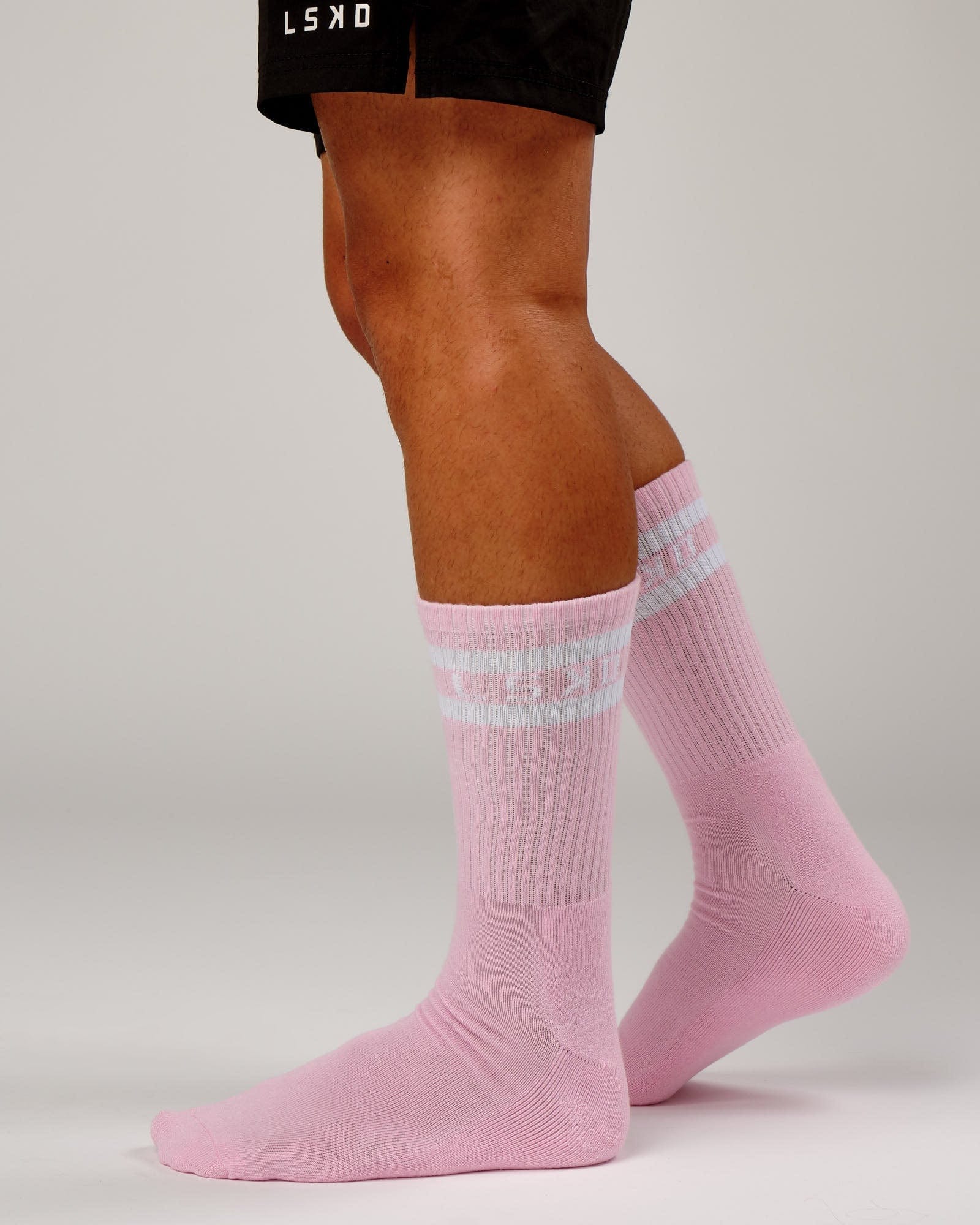 Model wearing Unisex A-Line Sock - Petal Pink
