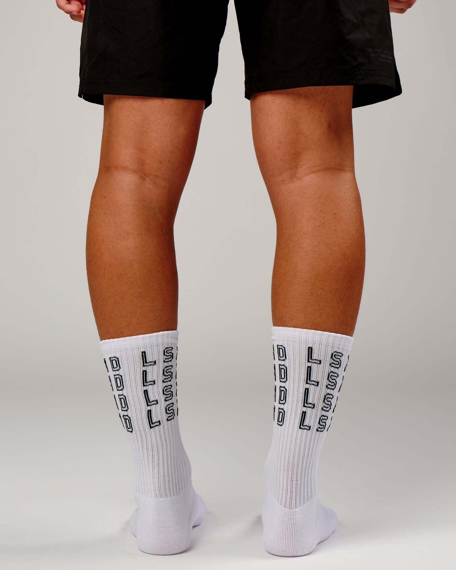 Model wearing Stacked Sock - White
