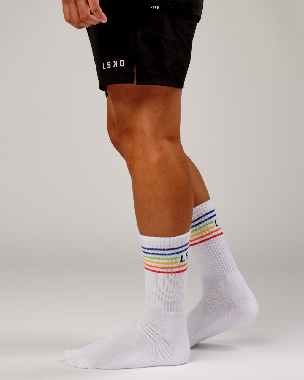 Model wearing Pride Sock - Pride-White