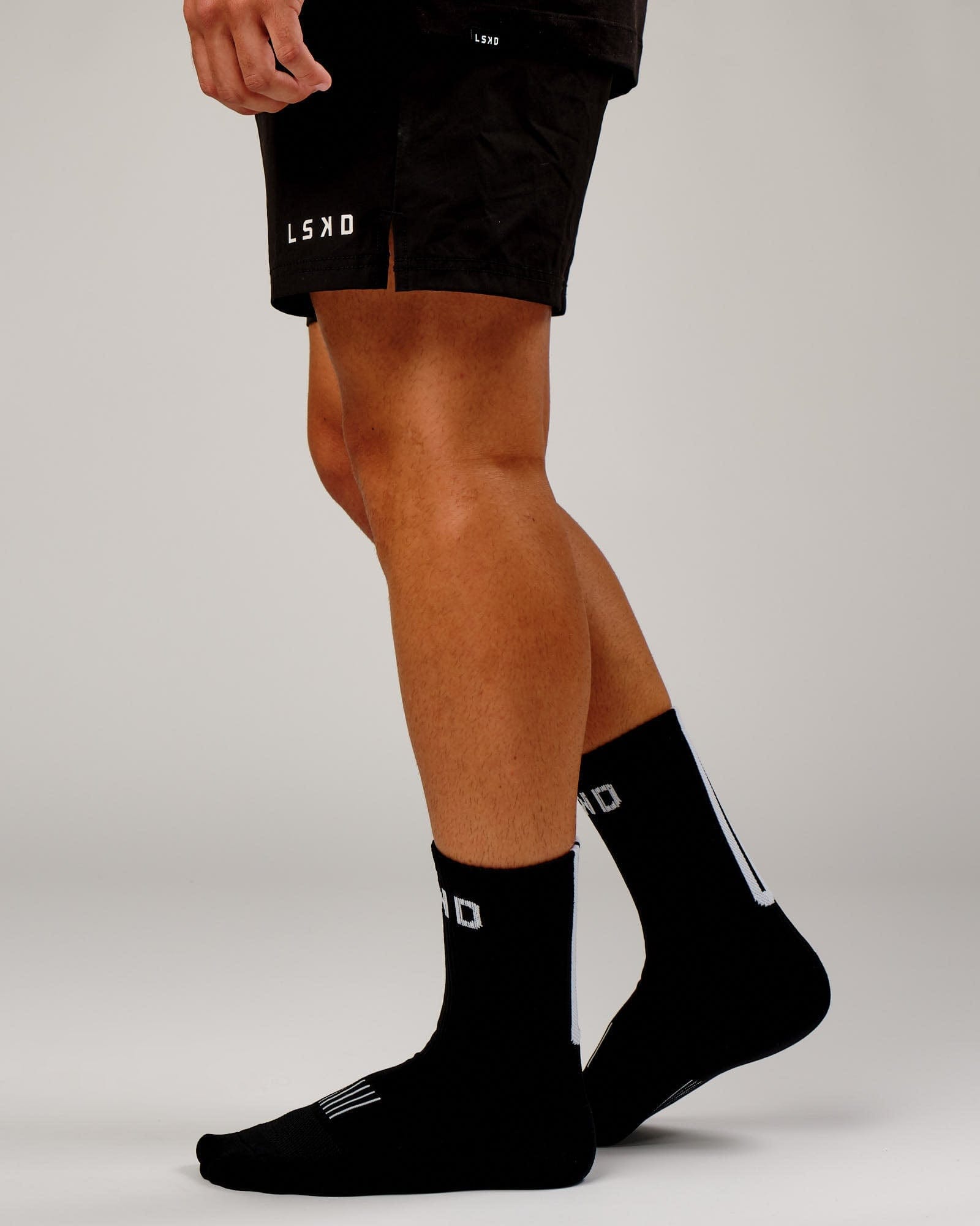 Model wearing Rep Crew Performance Sock - Black