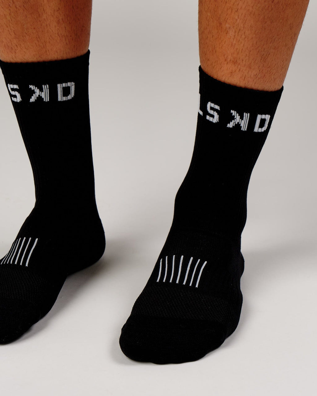 Model wearing Rep Crew Performance Sock - Black