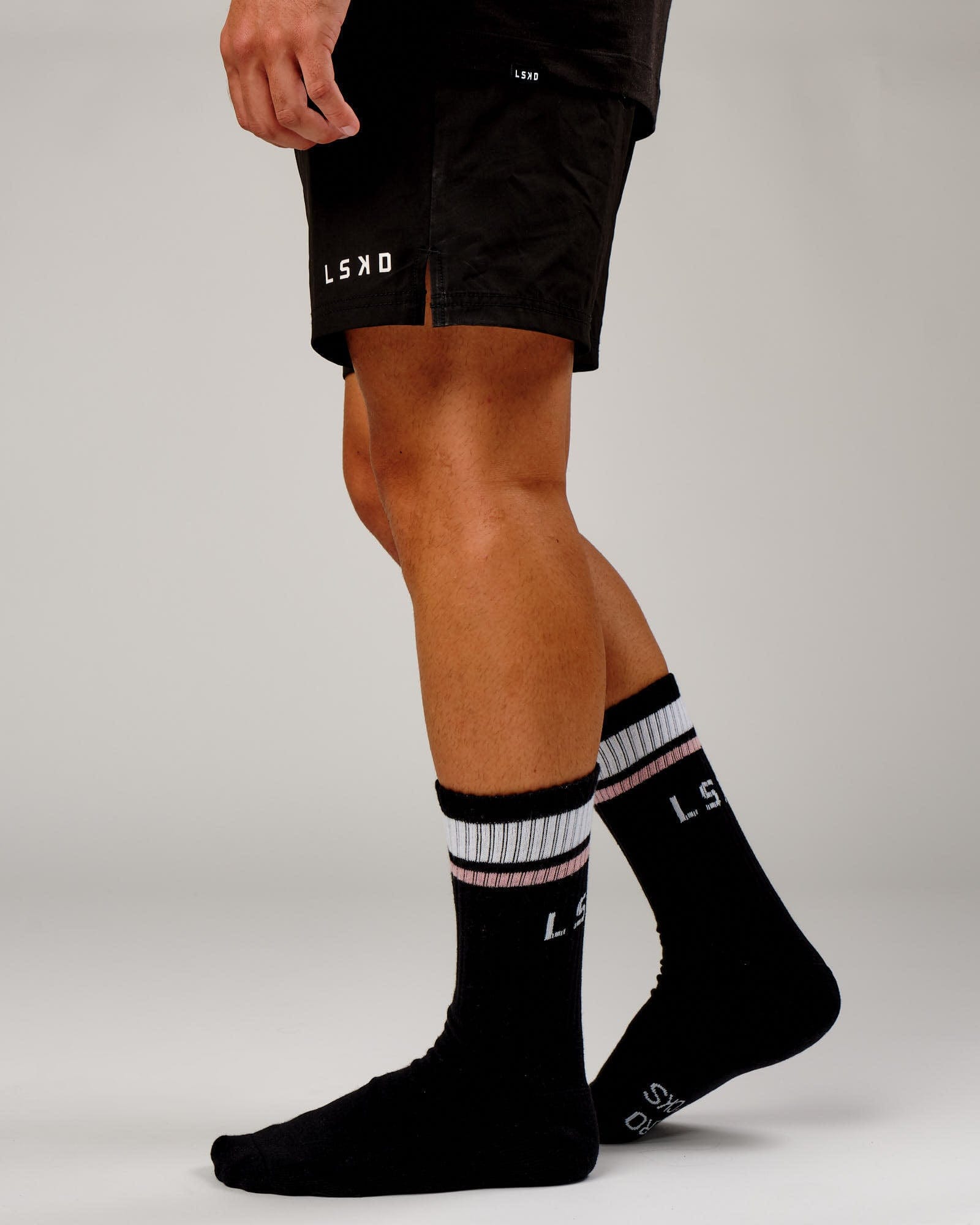 Model wearing Chiller Crew Sock - Black-Dusty Pink
