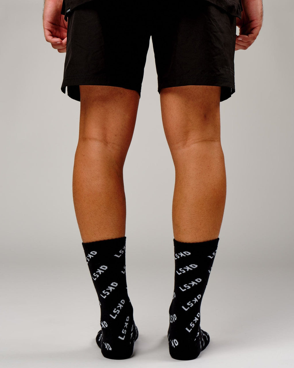 Model wearing Duplicate Sock - Black