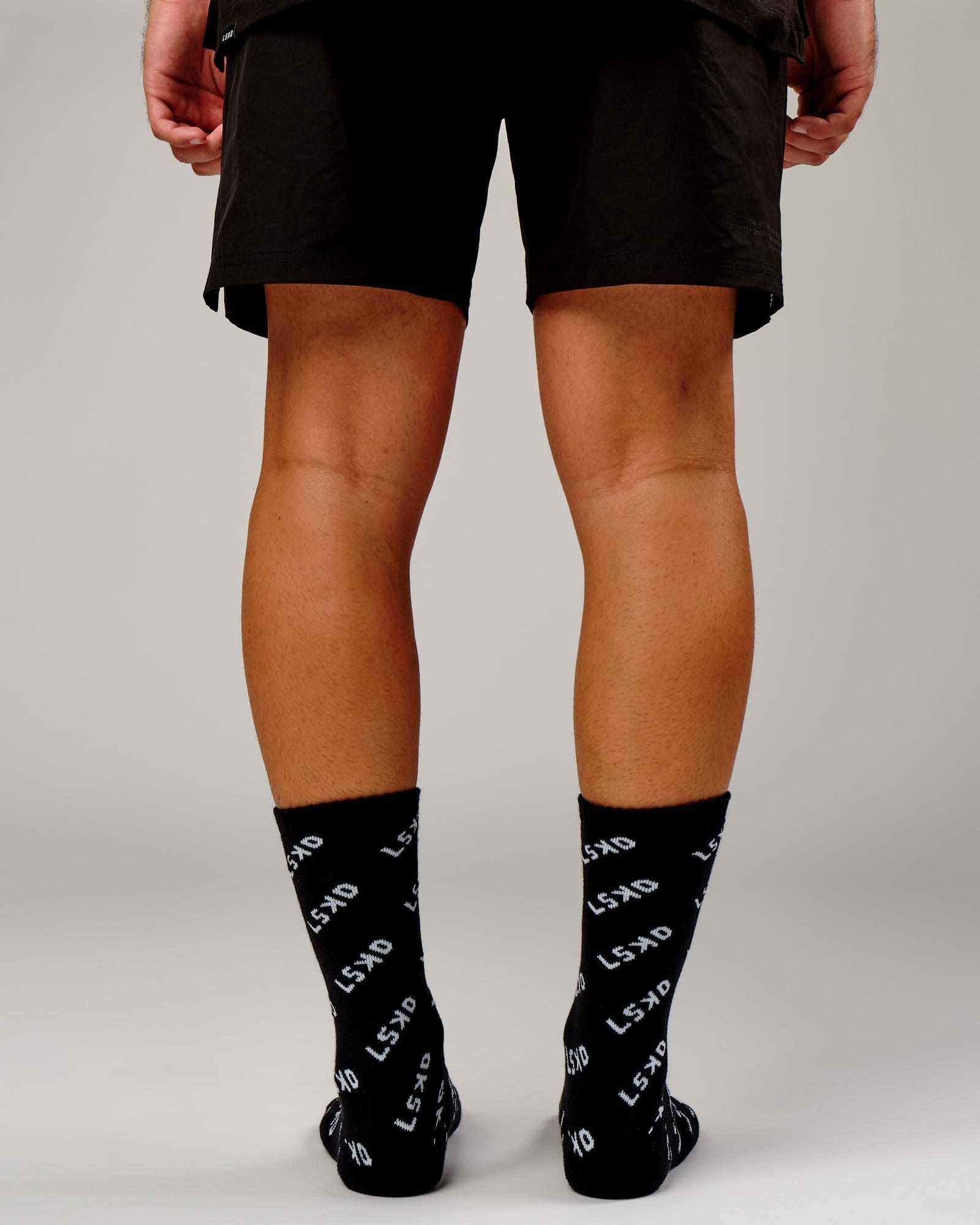 Model wearing Duplicate Sock - Black