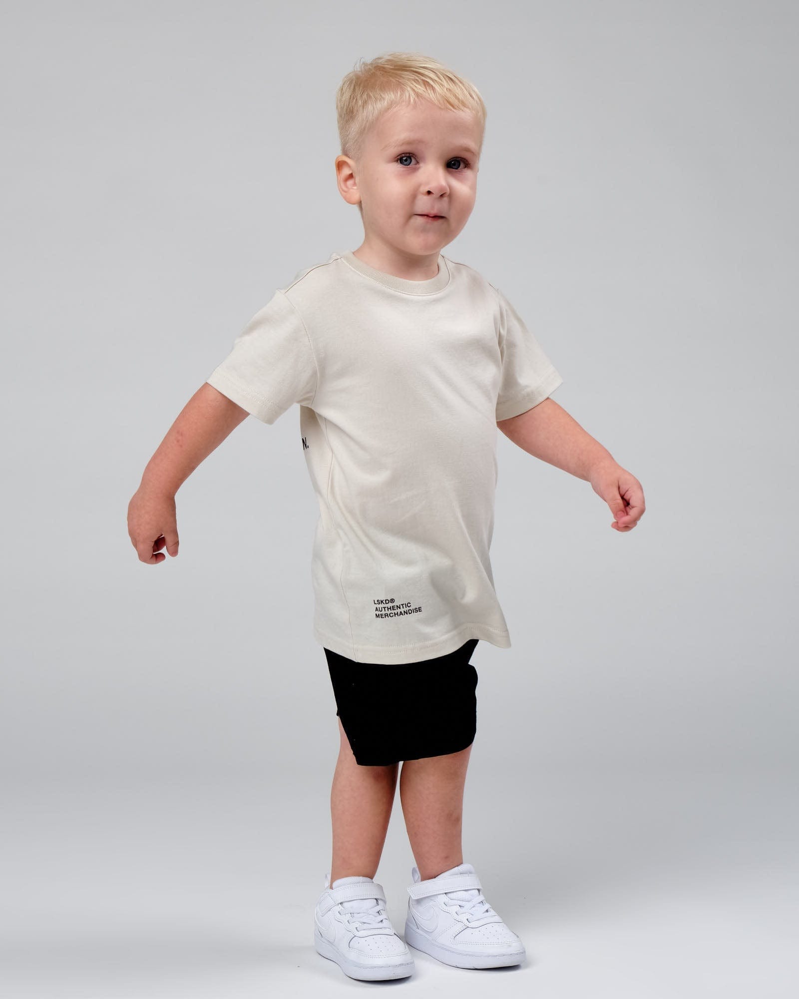 Model wearing OGTC Tee (00-8) - Bone