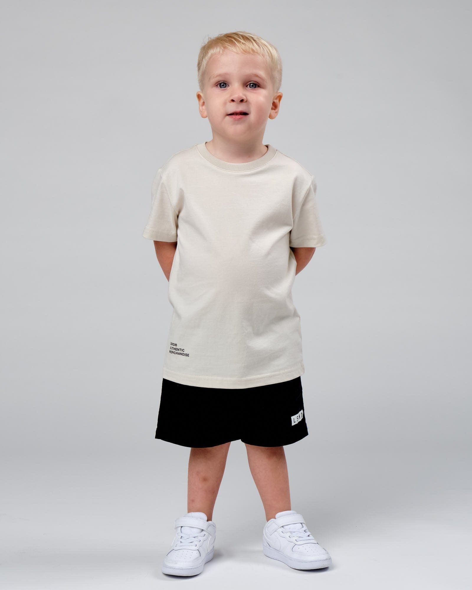 Model wearing OGTC Tee (00-8) - Bone