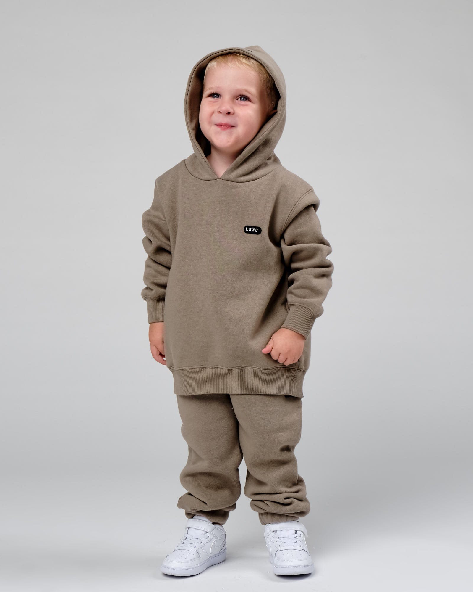 Model wearing Capsule Hoodie (00-8) - Laurel Oak