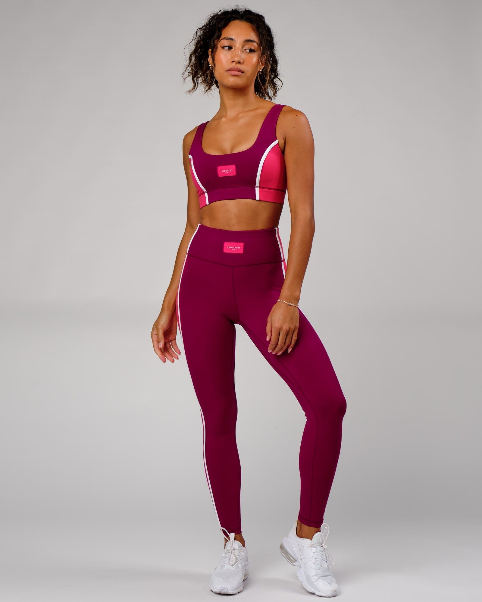 Model wearing Hunter Full Length Tight - Candy Apple-Boysenberry