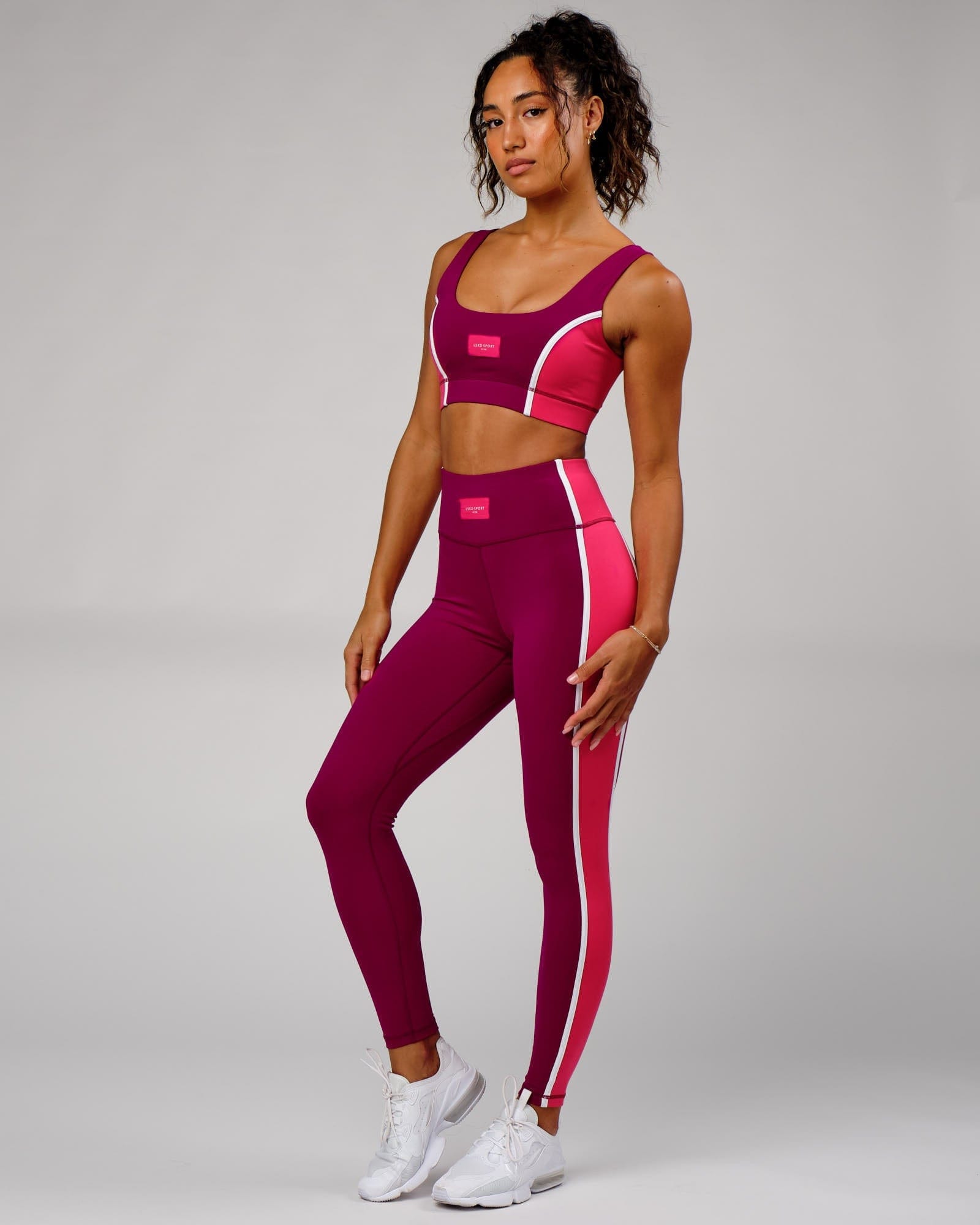 Model wearing Hunter Full Length Tight - Candy Apple-Boysenberry