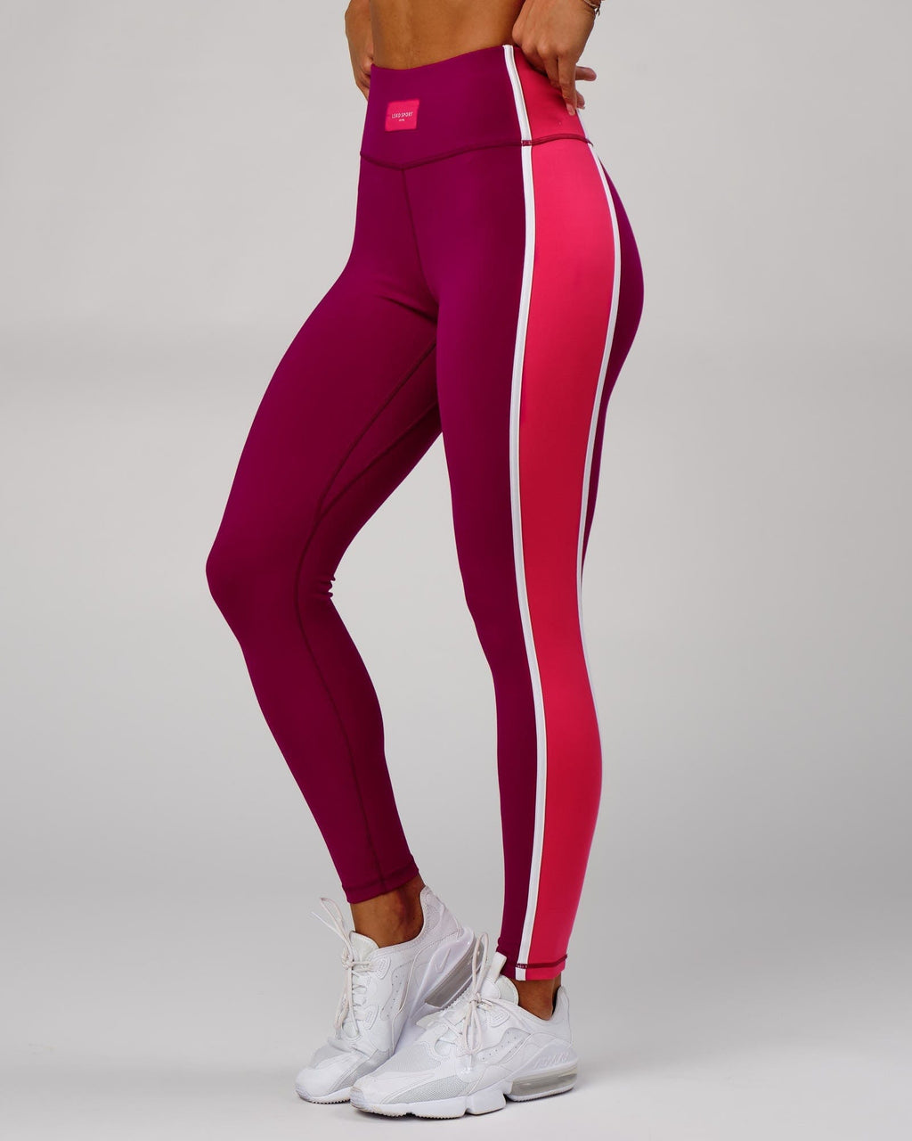 Model wearing Hunter Full Length Tight - Candy Apple-Boysenberry