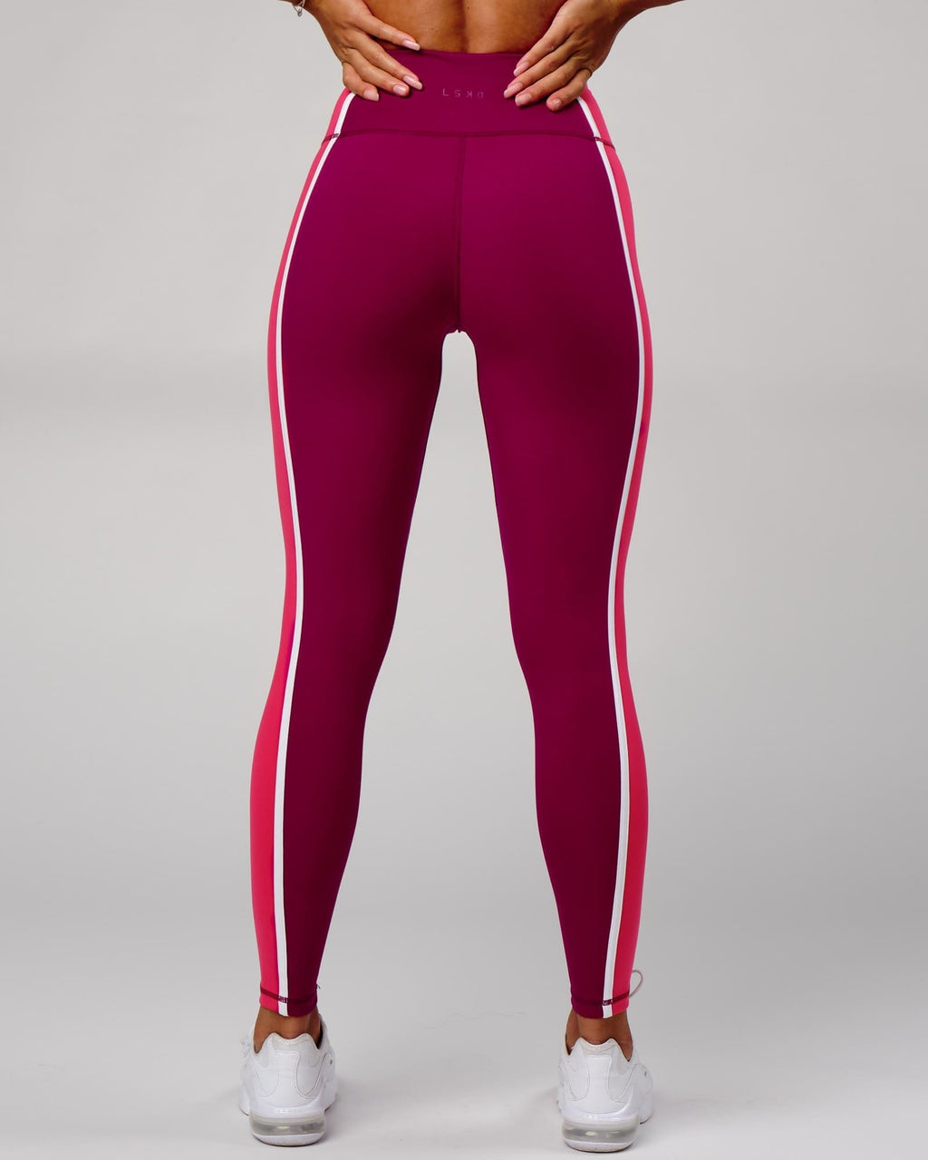 Model wearing Hunter Full Length Tight - Candy Apple-Boysenberry