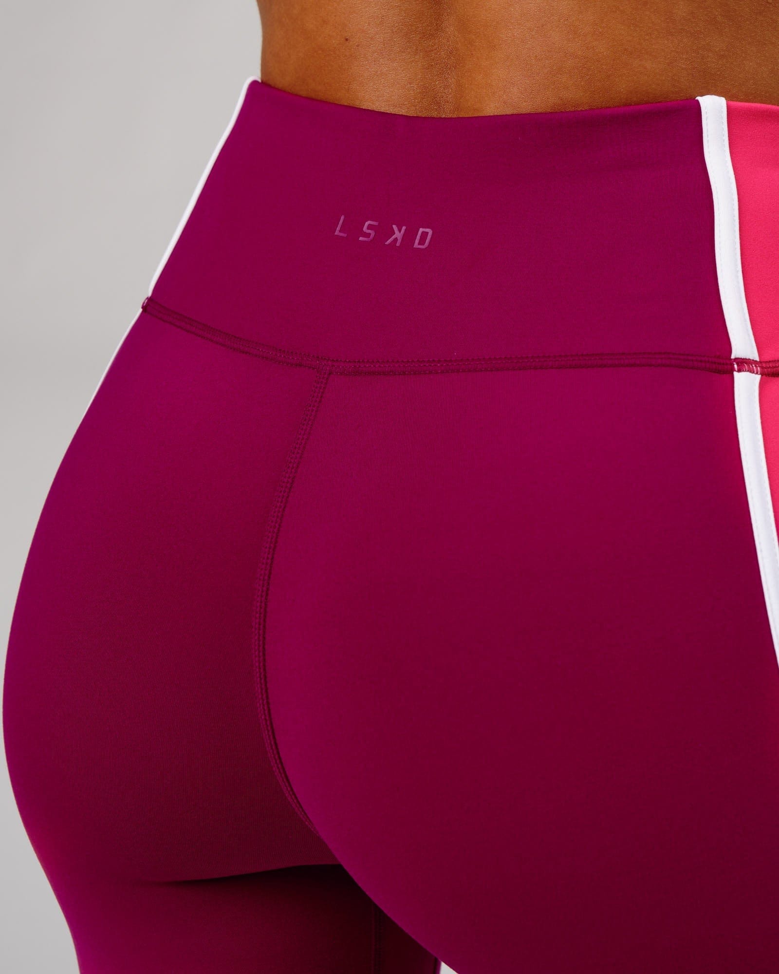 Model wearing Hunter Full Length Tight - Candy Apple-Boysenberry