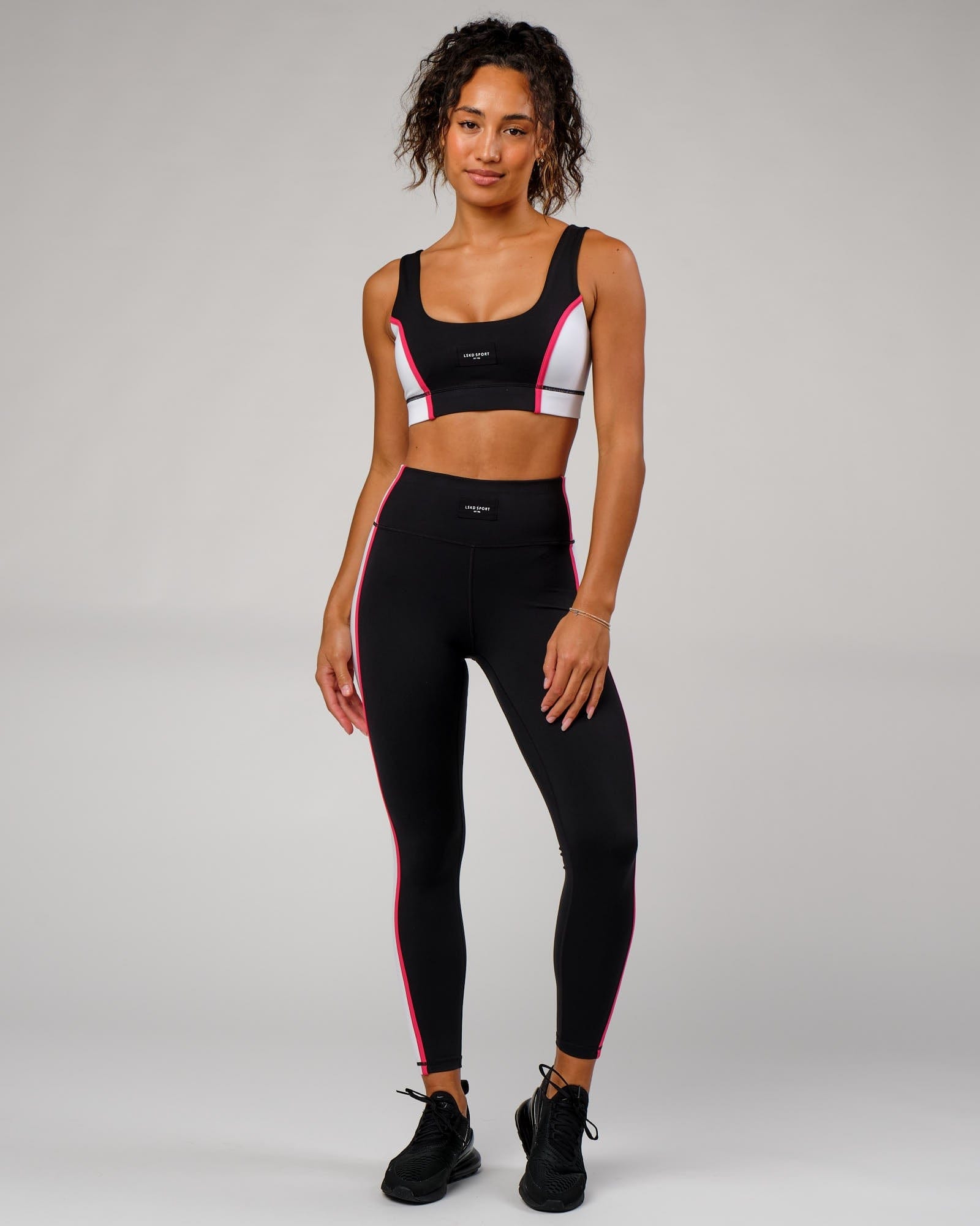 Model wearing Hunter Full Length Tight - Black-Boysenberry