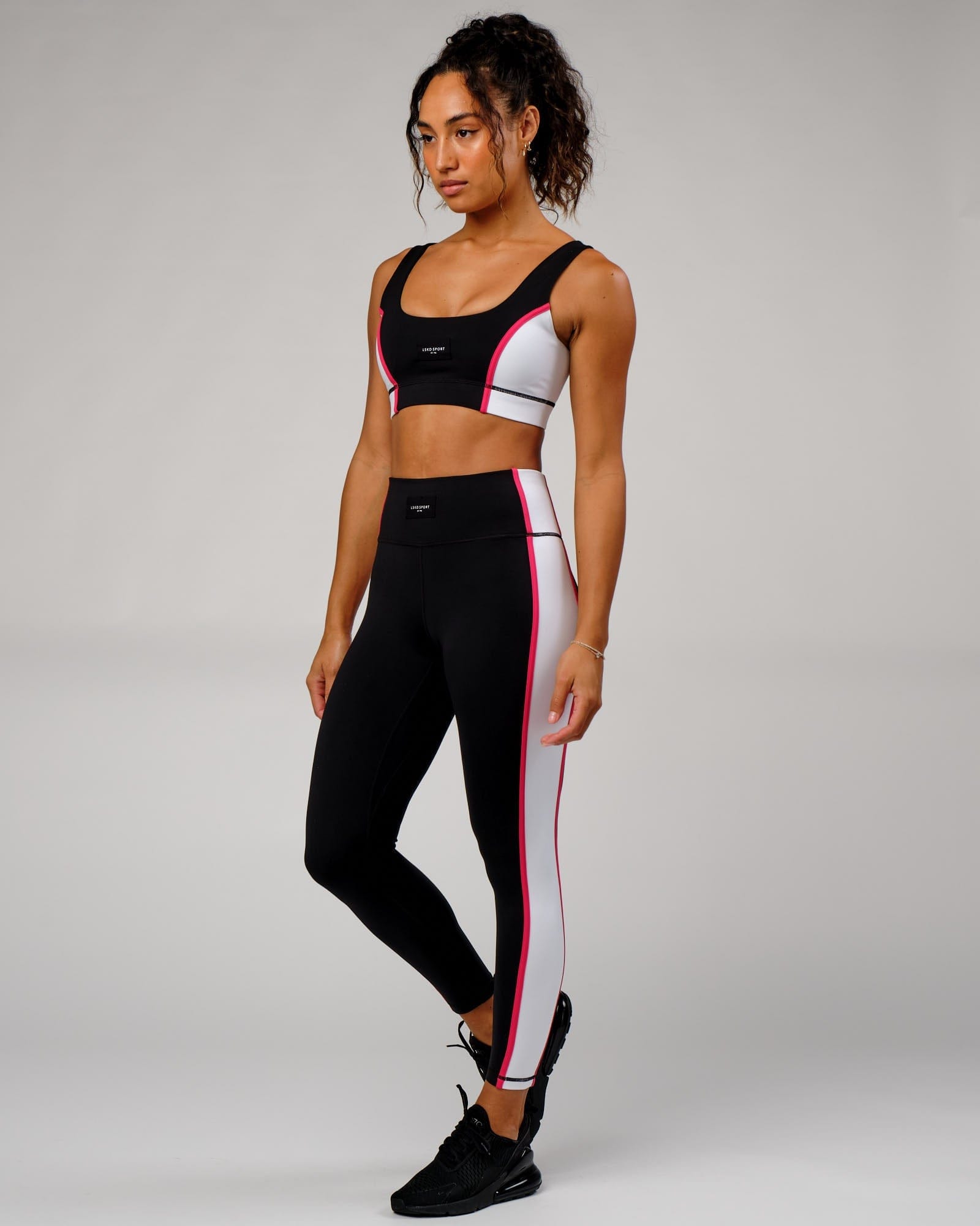 Model wearing Hunter Full Length Tight - Black-Boysenberry