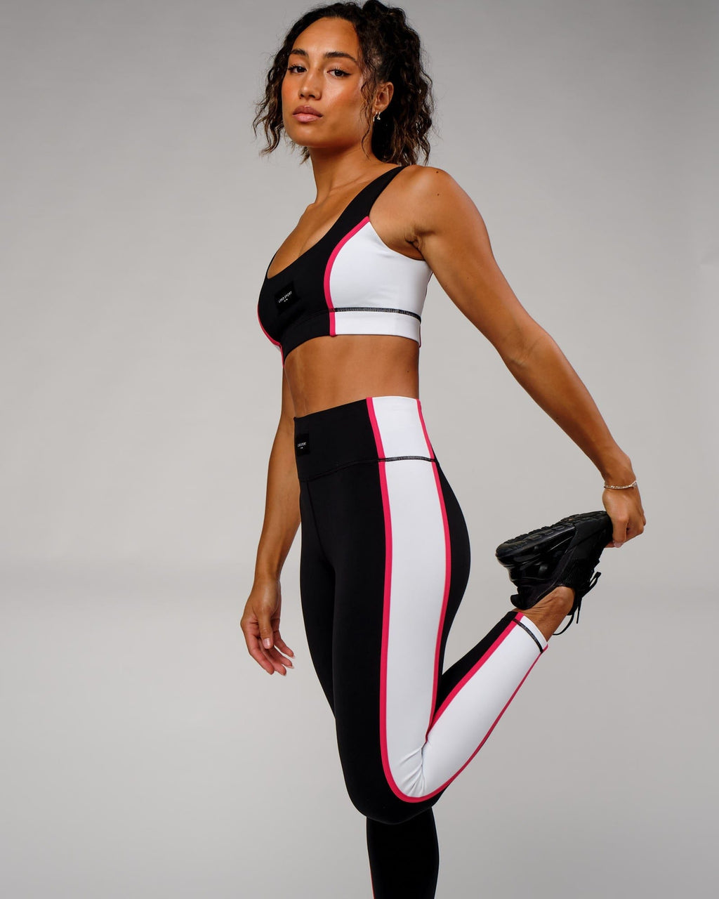 Model wearing Hunter Full Length Tight - Black-Boysenberry