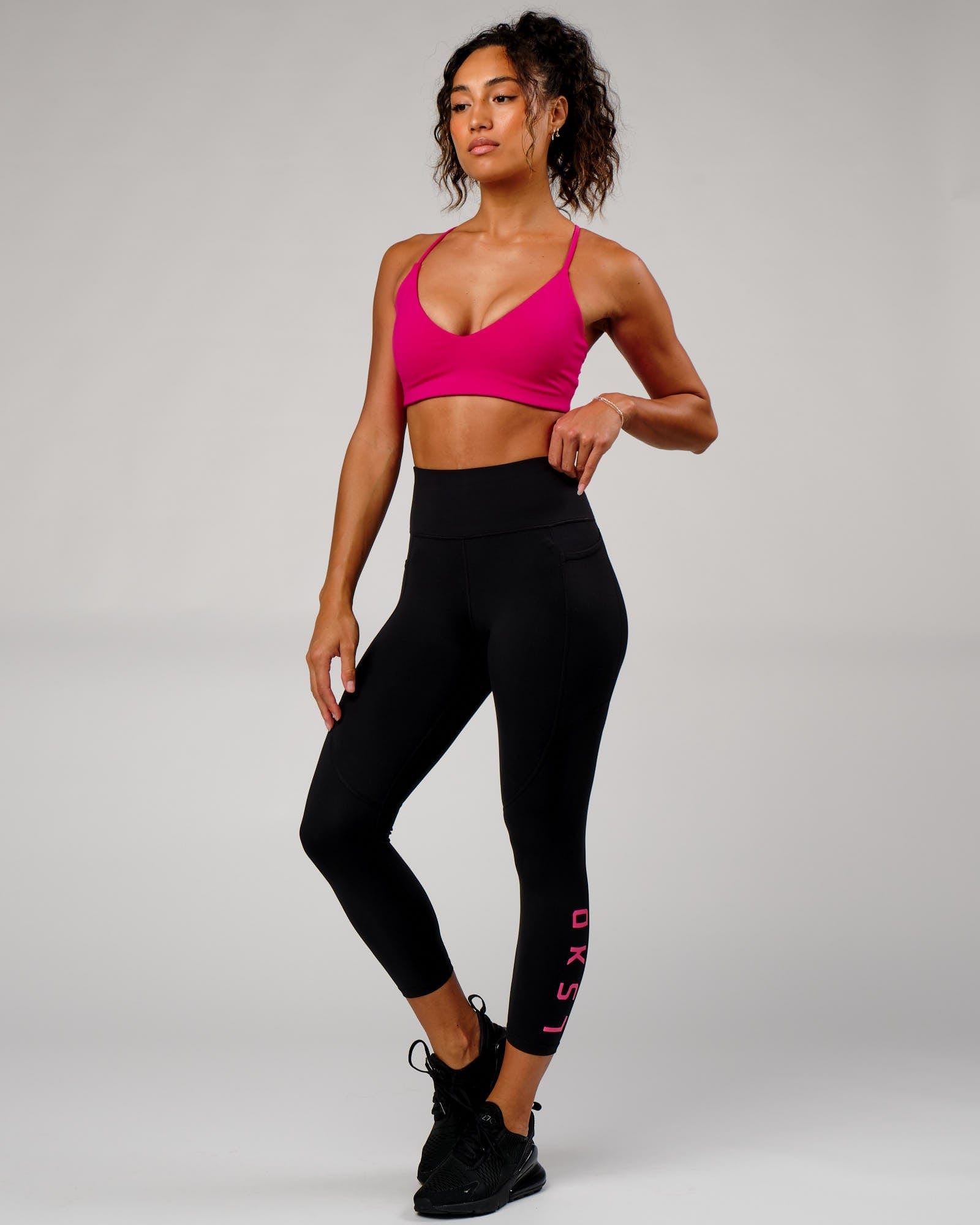 Model wearing Rep 7/8 Length Tight - Black-Boysenberry