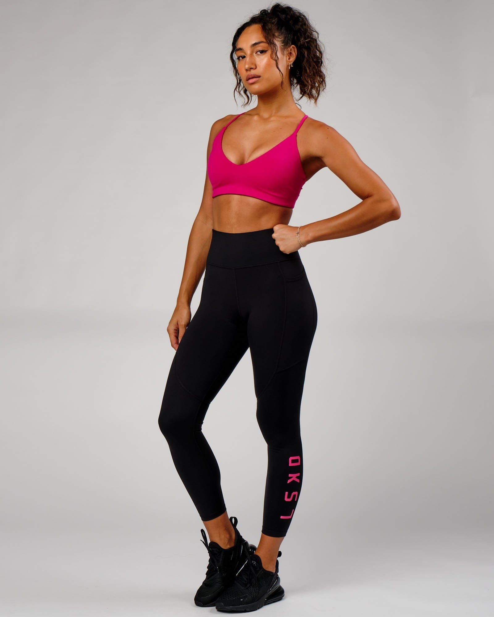 Model wearing Rep Full Length Tight - Black-Boysenberry