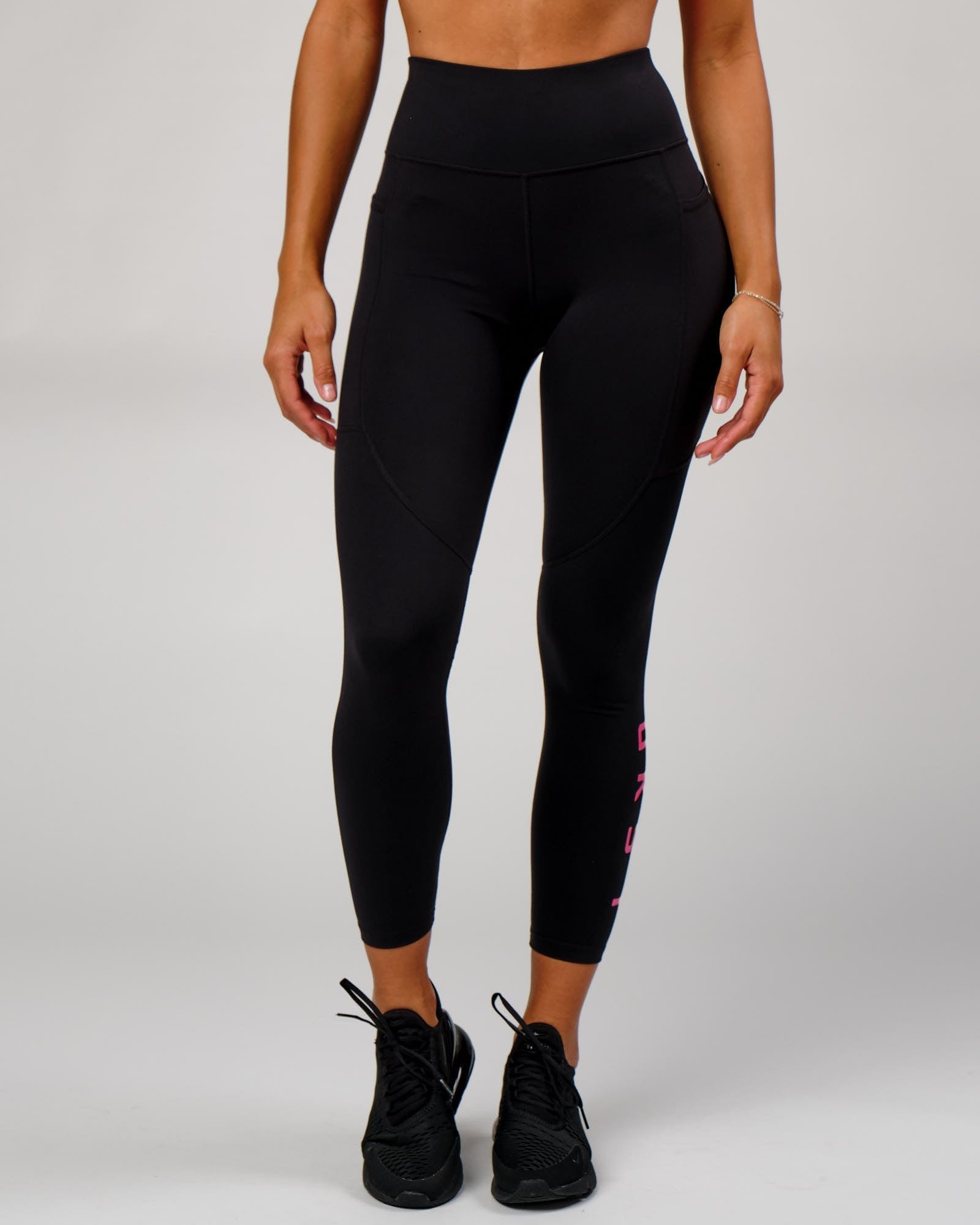 Model wearing Rep Full Length Tight - Black-Boysenberry