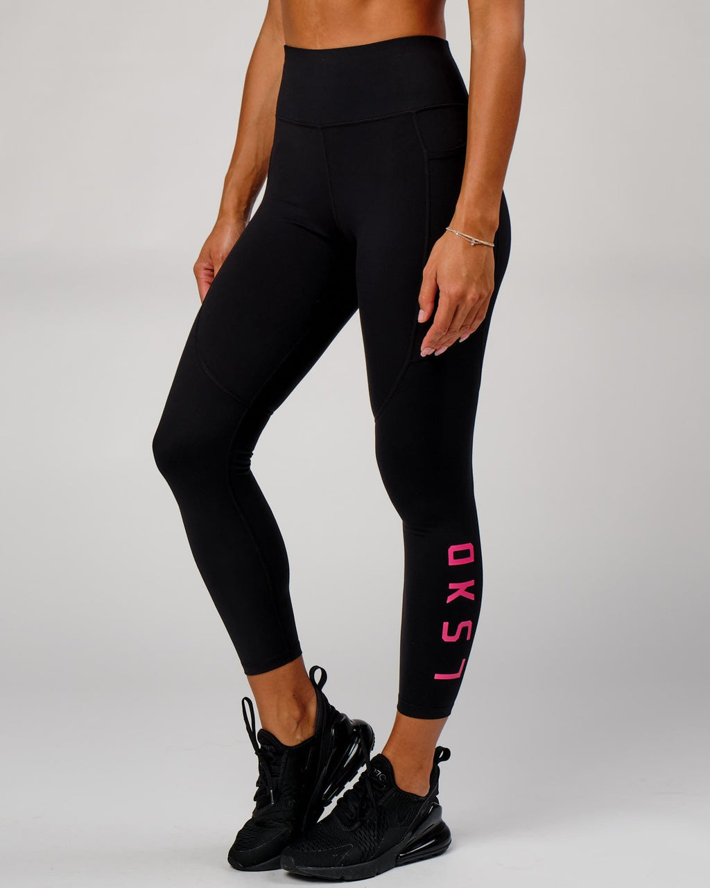 Model wearing Rep Full Length Tight - Black-Boysenberry