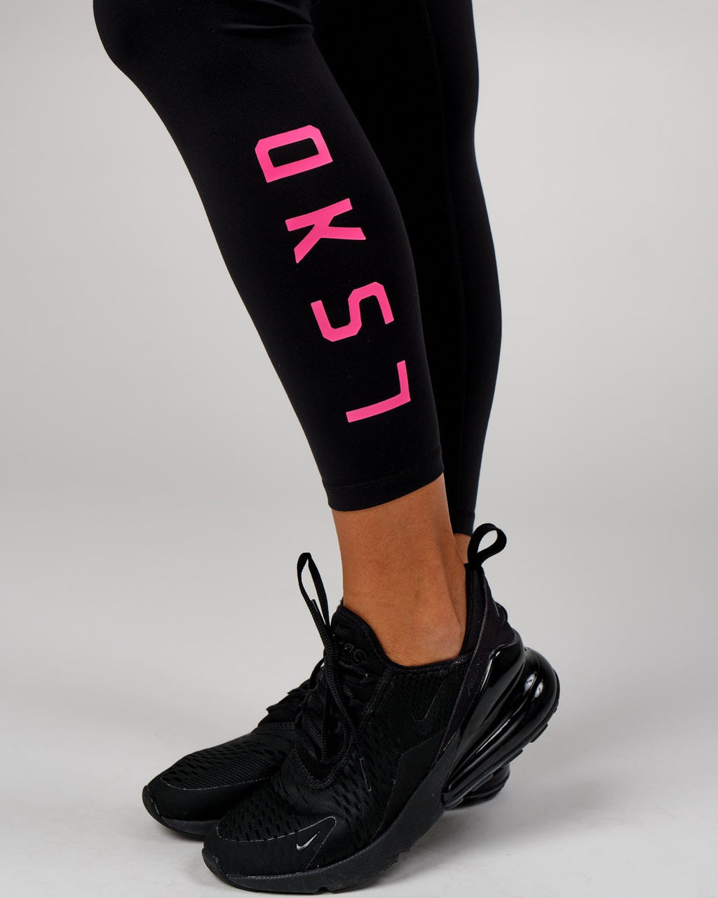 Model wearing Rep Full Length Tight - Black-Boysenberry