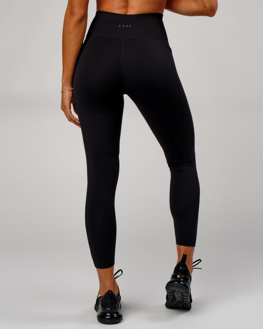 Model wearing Rep Full Length Tight - Black-Boysenberry