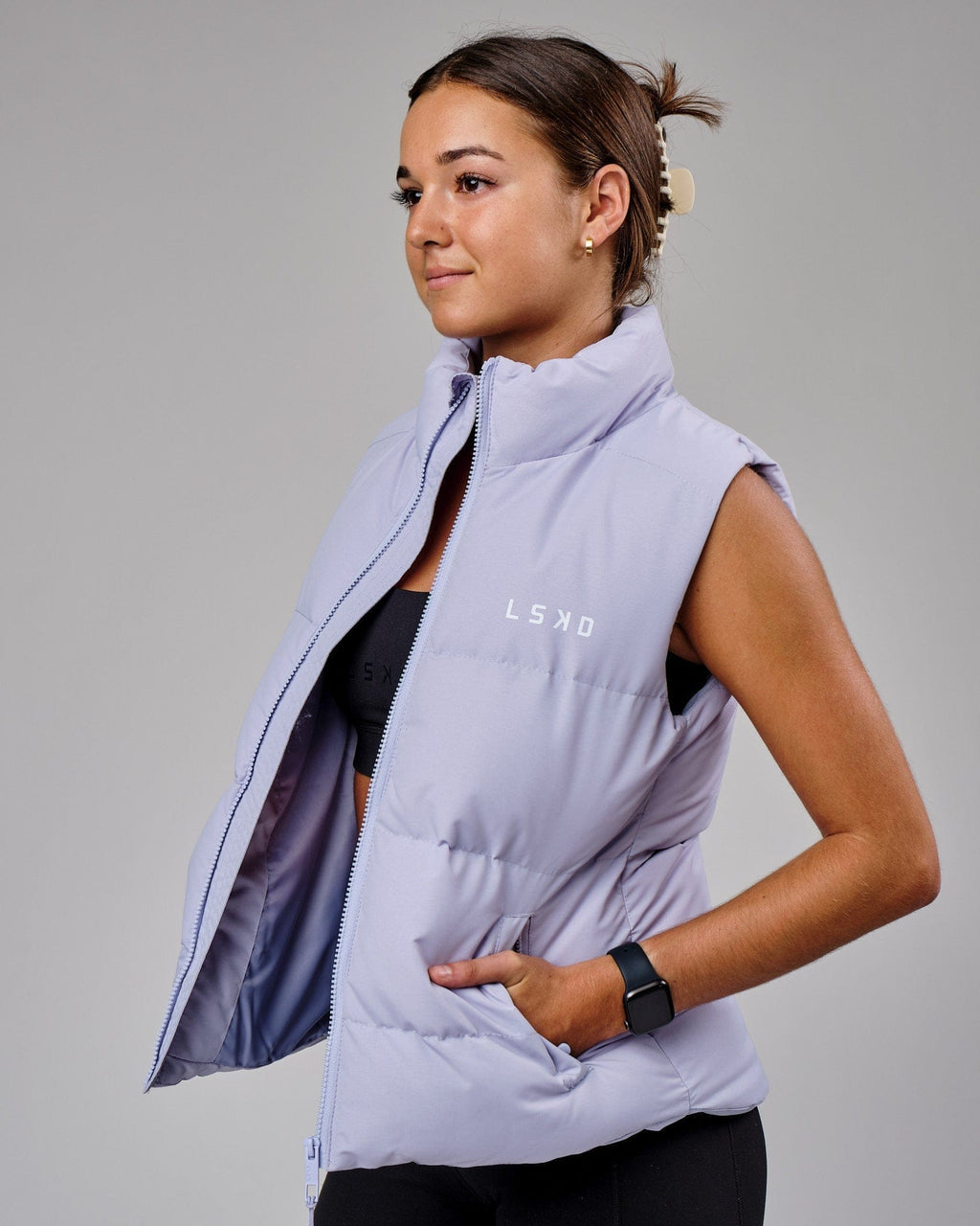 Model wearing Essential Puffer Vest - Cosmic Sky