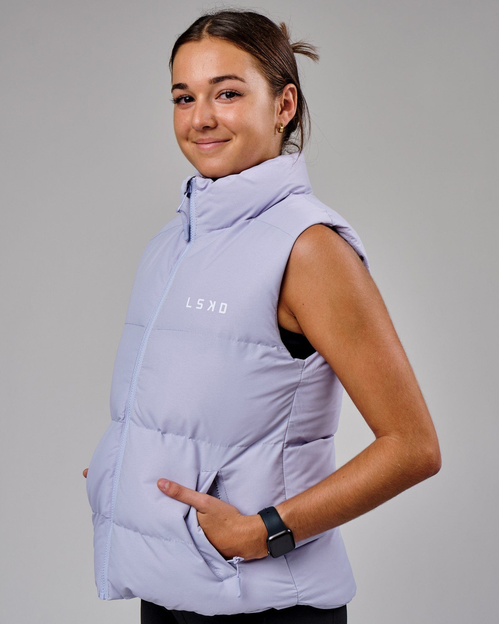 Model wearing Essential Puffer Vest - Cosmic Sky