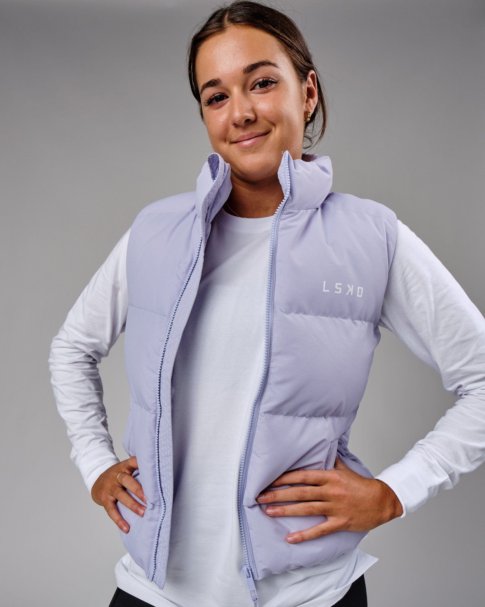 Model wearing Essential Puffer Vest - Cosmic Sky