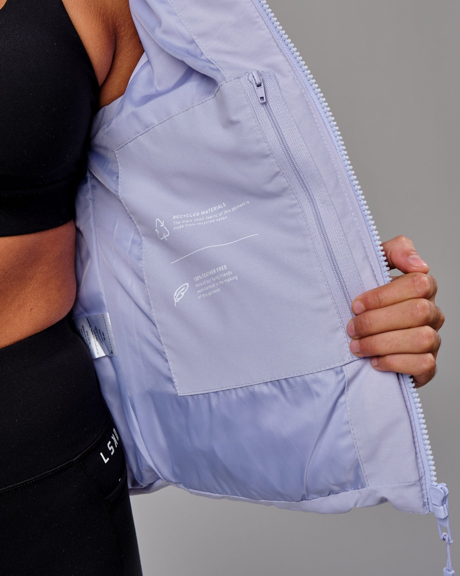 Model wearing Essential Puffer Vest - Cosmic Sky