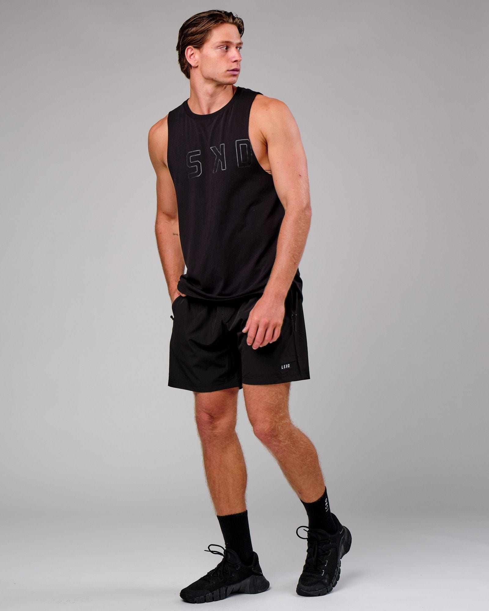 Model wearing Rep 7'' Performance Short - Black