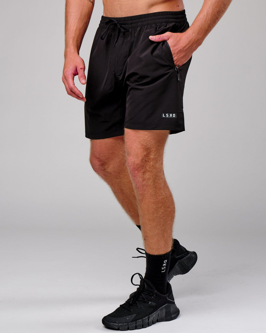 Model wearing Rep 7'' Performance Short - Black