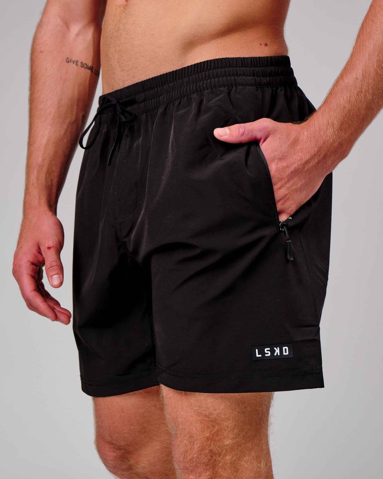 Model wearing Rep 7'' Performance Short - Black