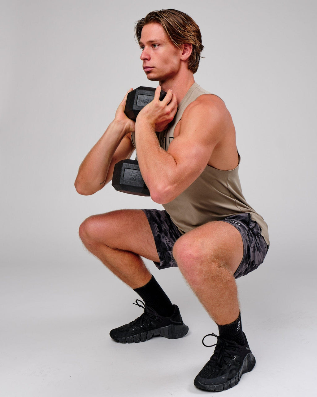 Model wearing Rep 7" Performance Short - Urban Camo