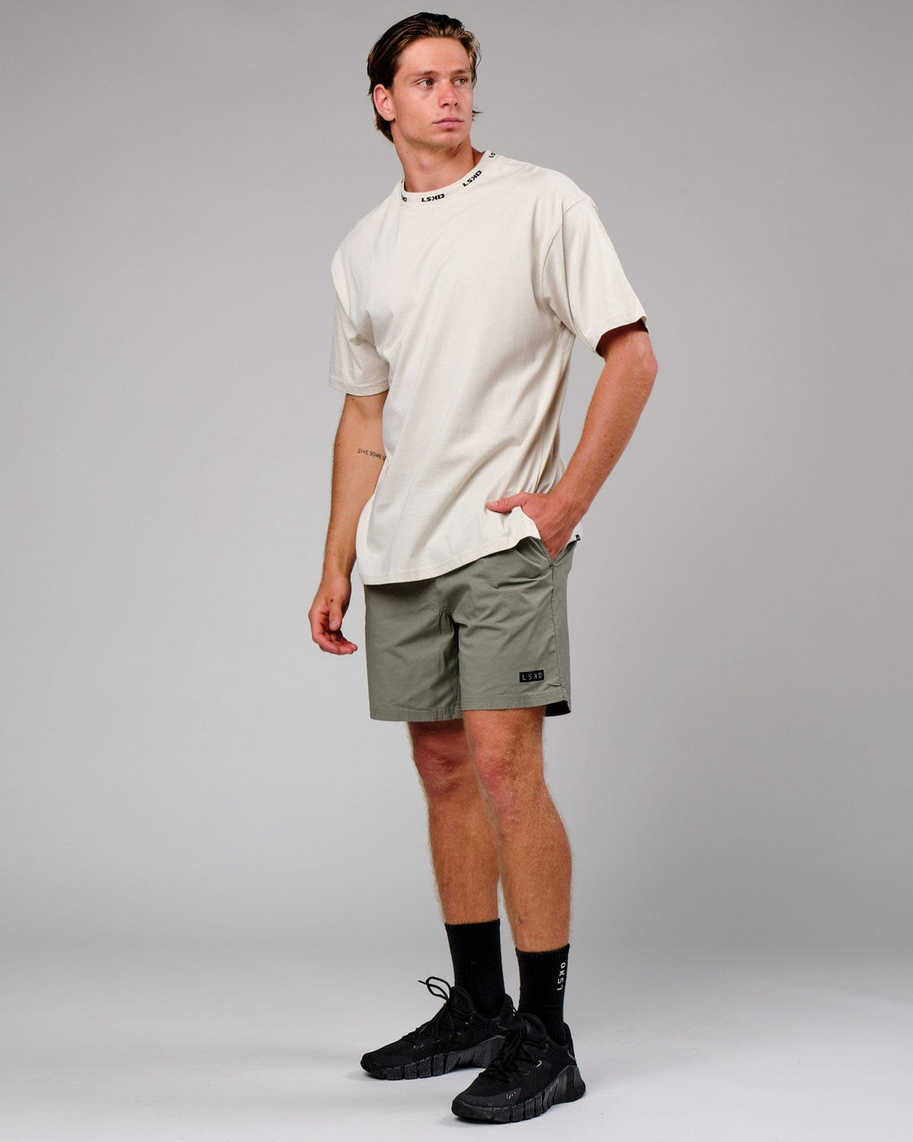 Model wearing Daily Short - Dusty Olive
