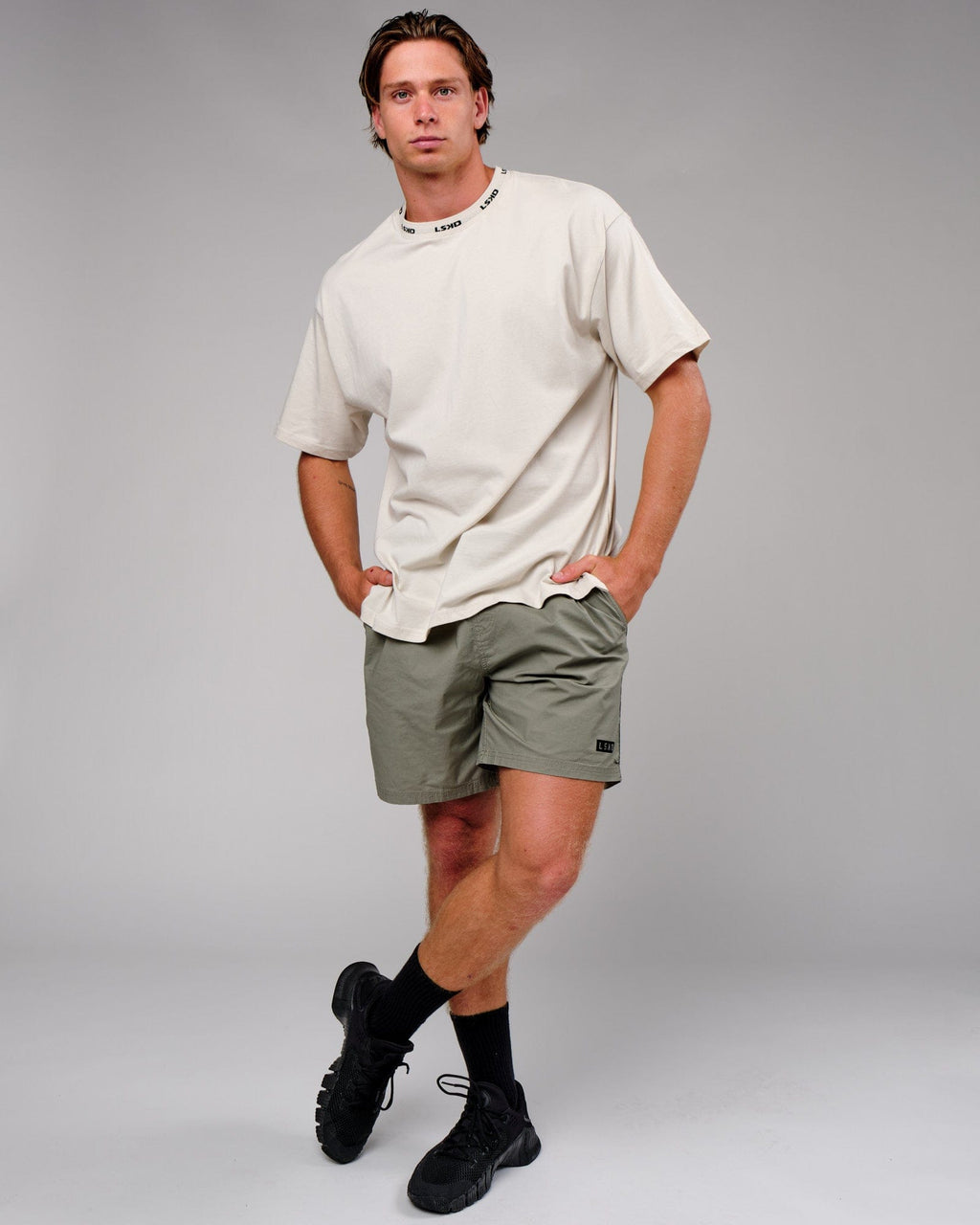 Model wearing Daily Short - Dusty Olive