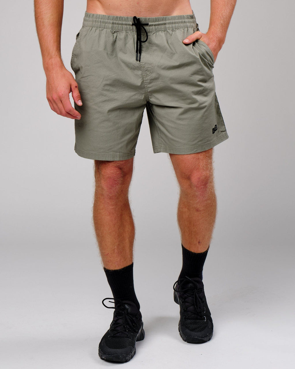 Model wearing Daily Short - Dusty Olive