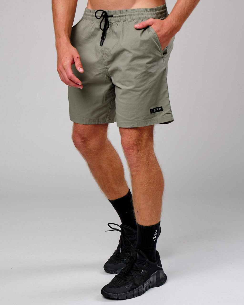 Model wearing Daily Short - Dusty Olive