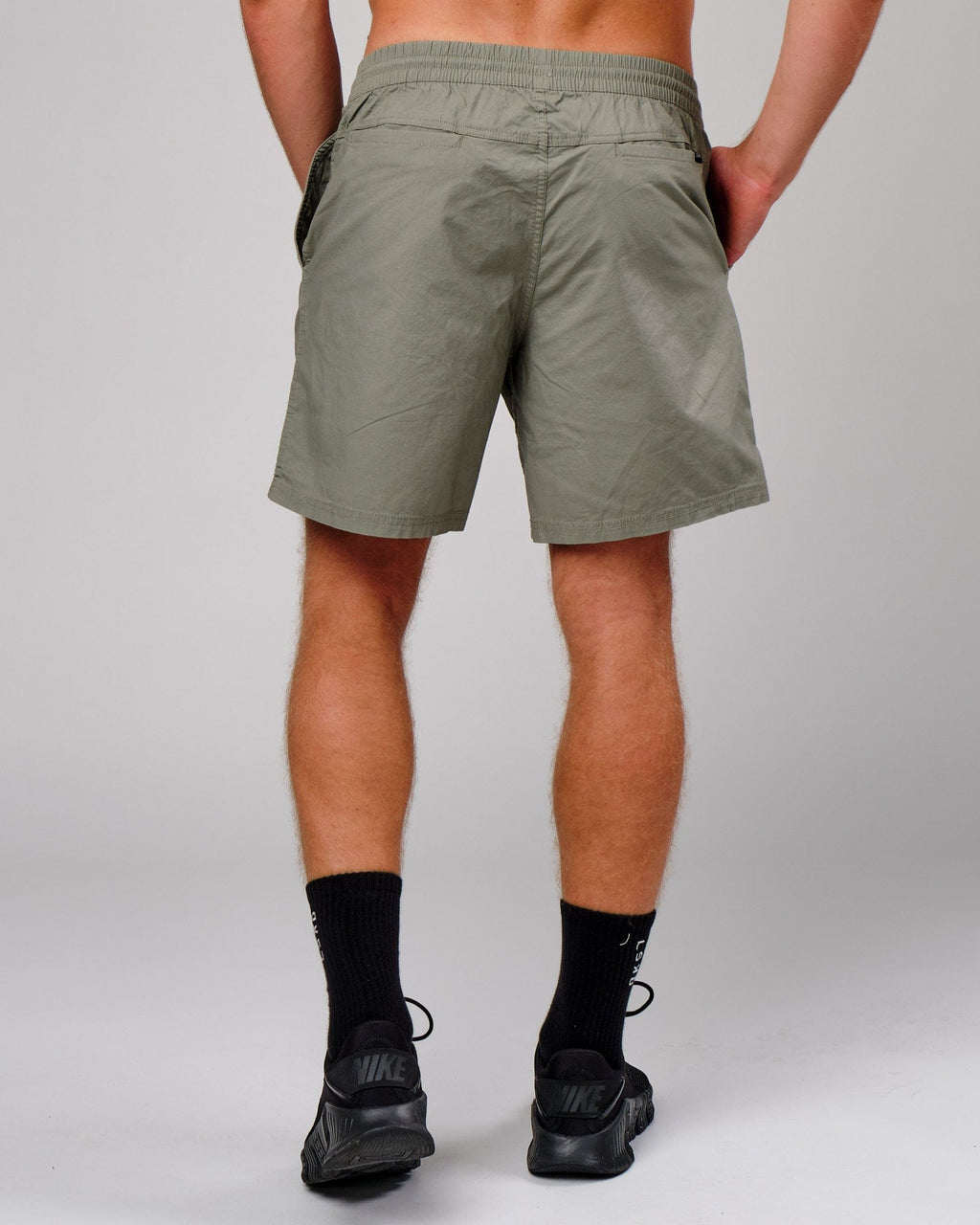 Model wearing Daily Short - Dusty Olive
