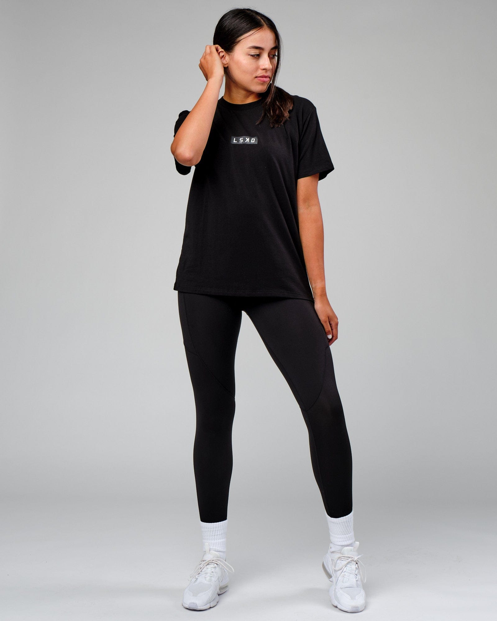 Model wearing Velocity Tee - Black