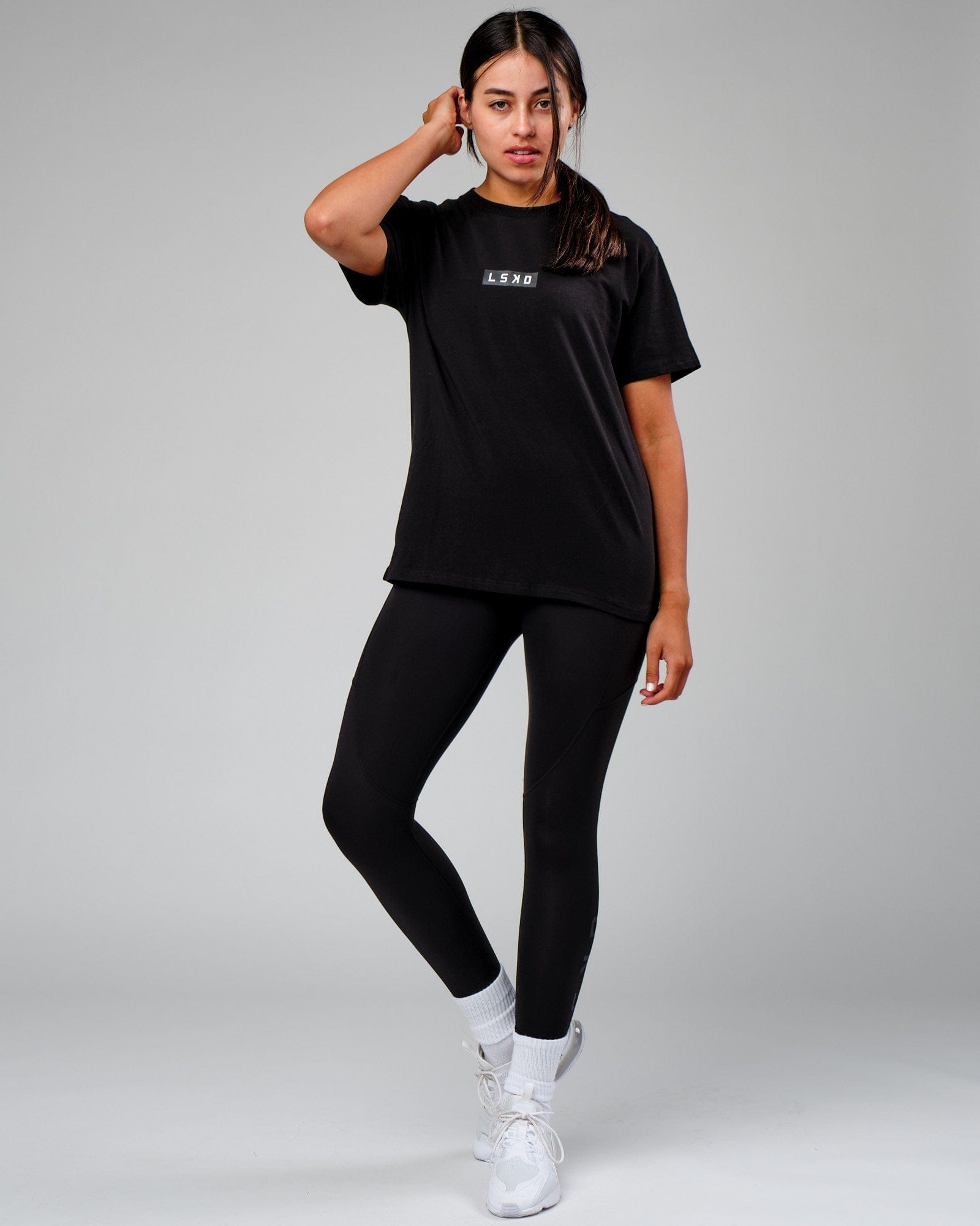 Model wearing Velocity Tee - Black