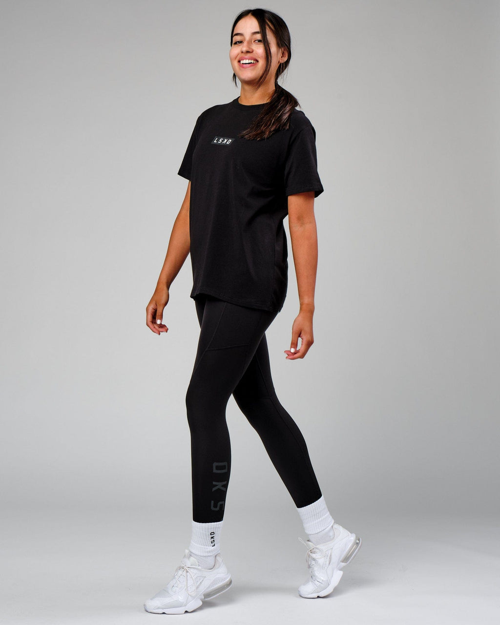 Model wearing Velocity Tee - Black