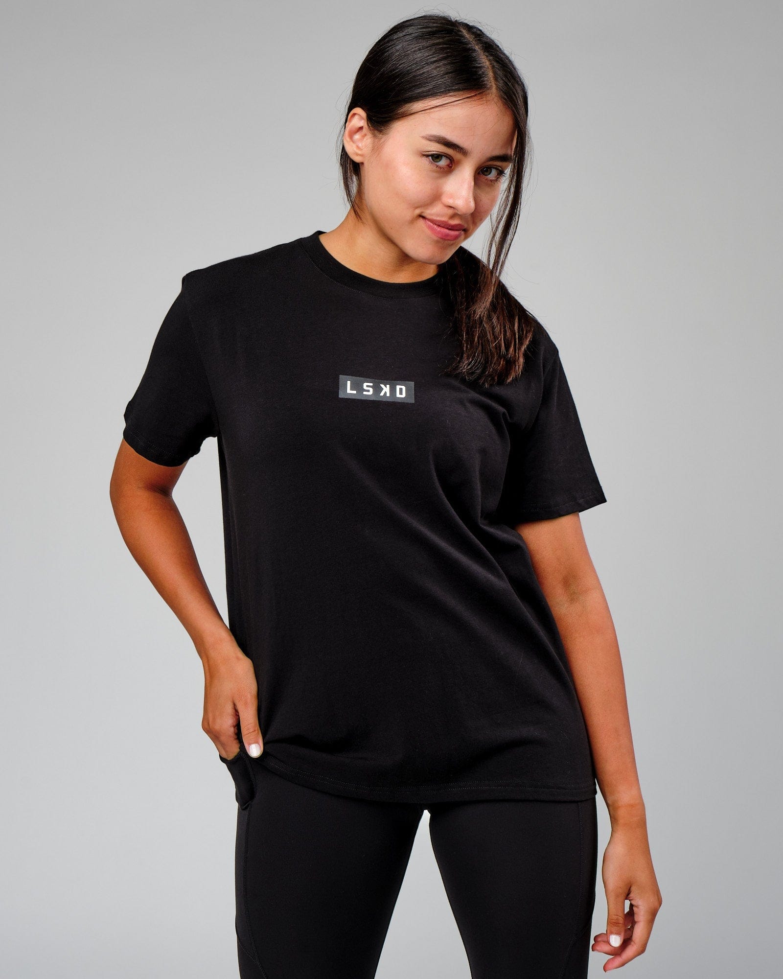 Model wearing Velocity Tee - Black