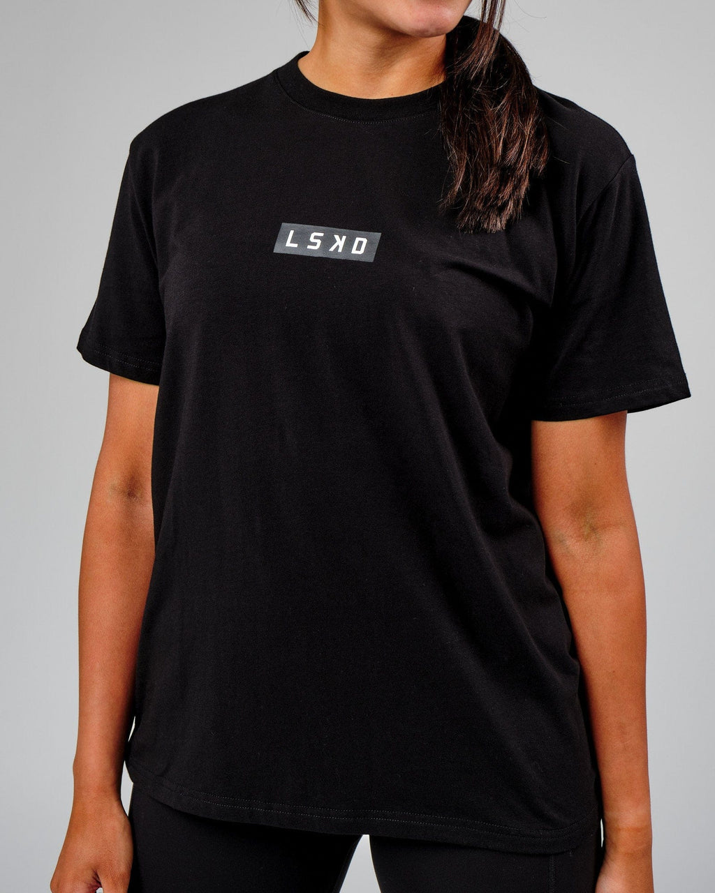 Model wearing Velocity Tee - Black