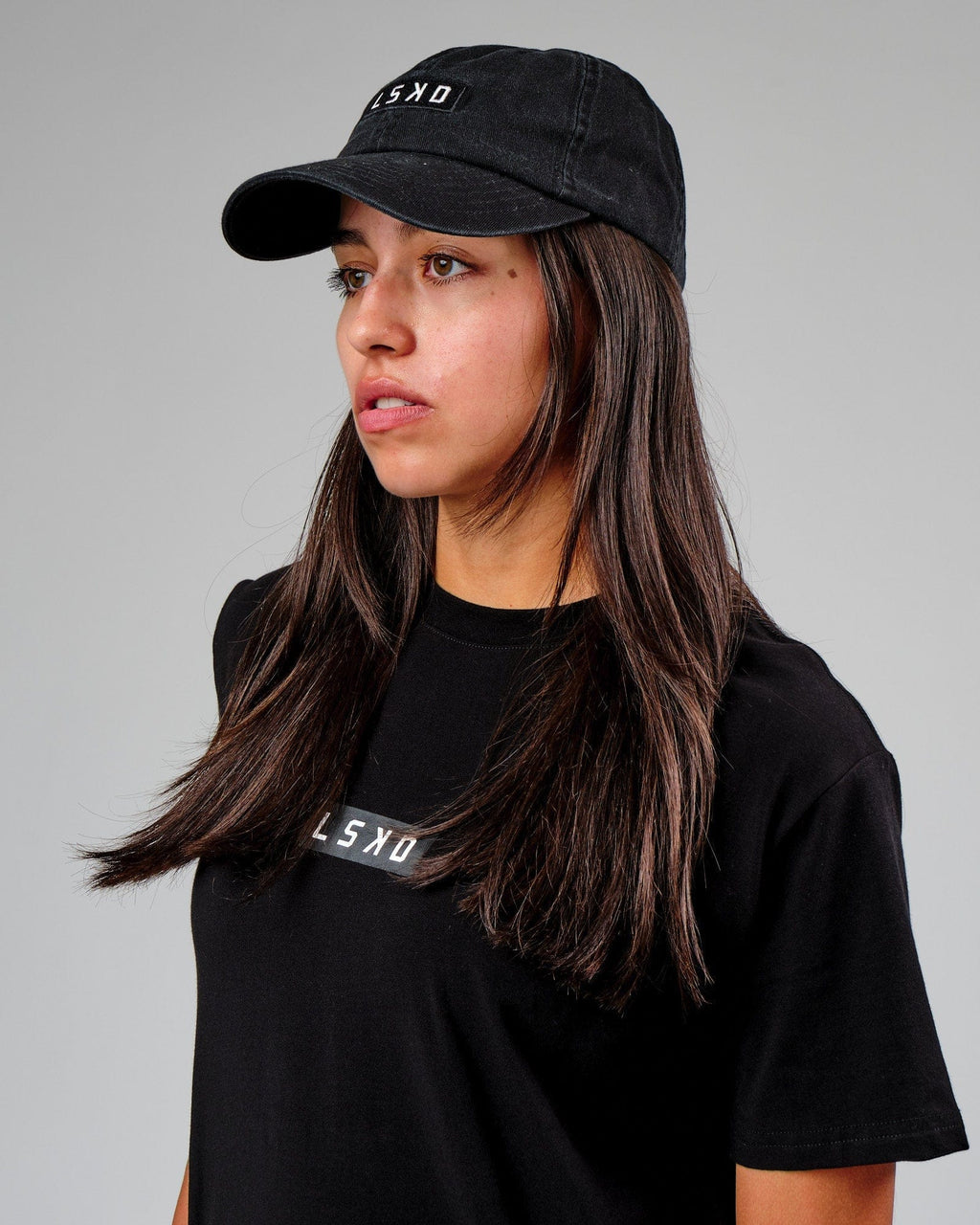 Model wearing Velocity Cap - Black