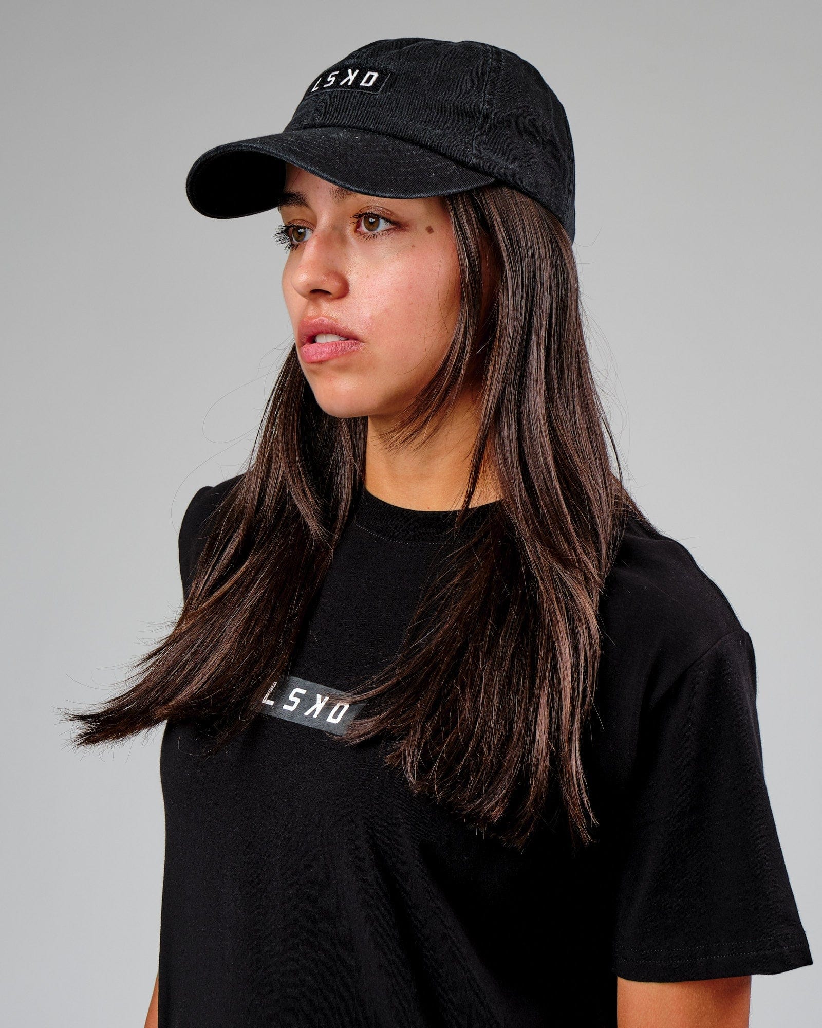 Model wearing Velocity Cap - Black