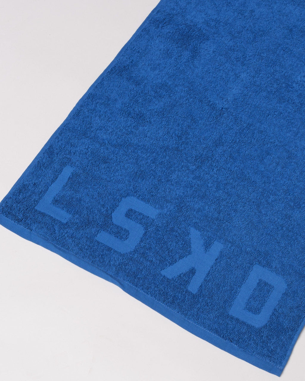 Model wearing Layer Towel - Turkish Sea