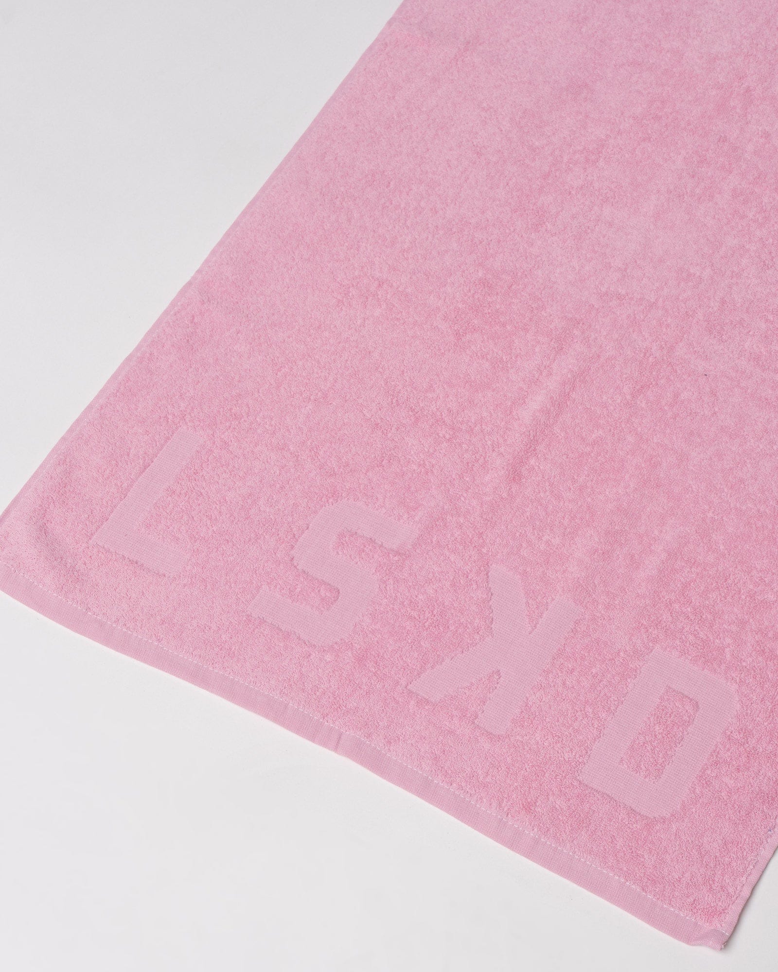 Model wearing Layer Towel - Petal Pink