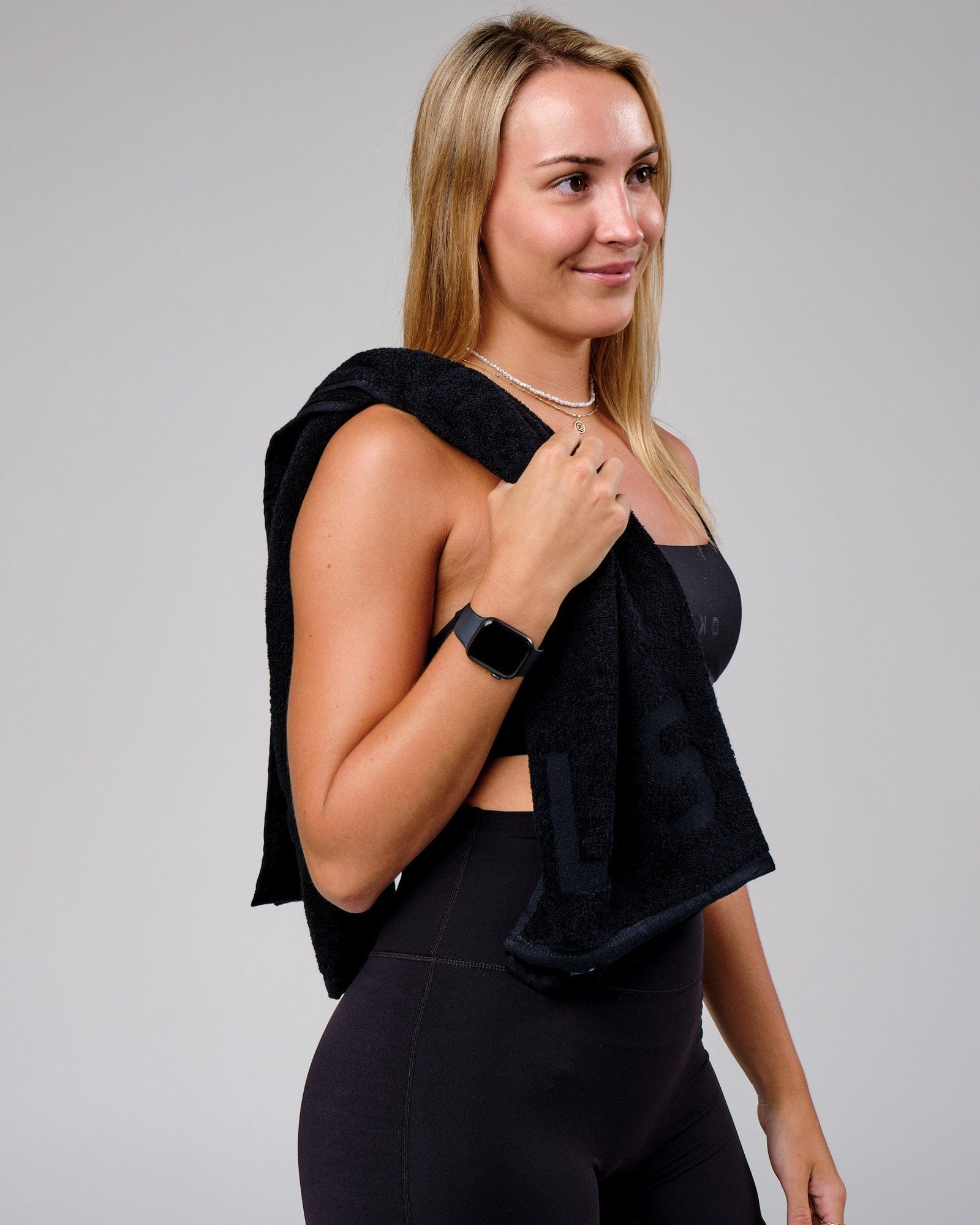 Model wearing Layer Towel - Black