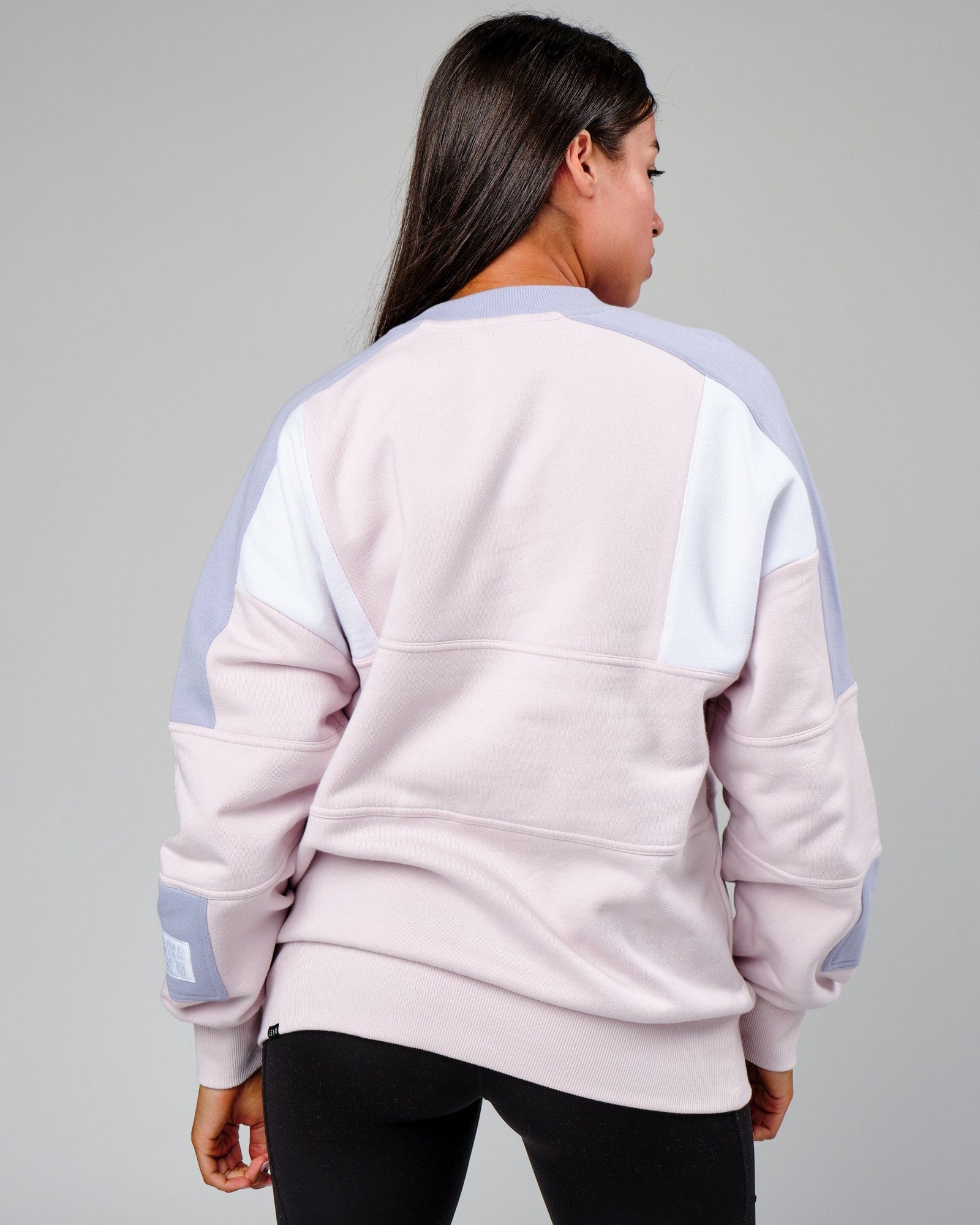 Model wearing Unisex Slam Sweater Oversize - Orchid Ice